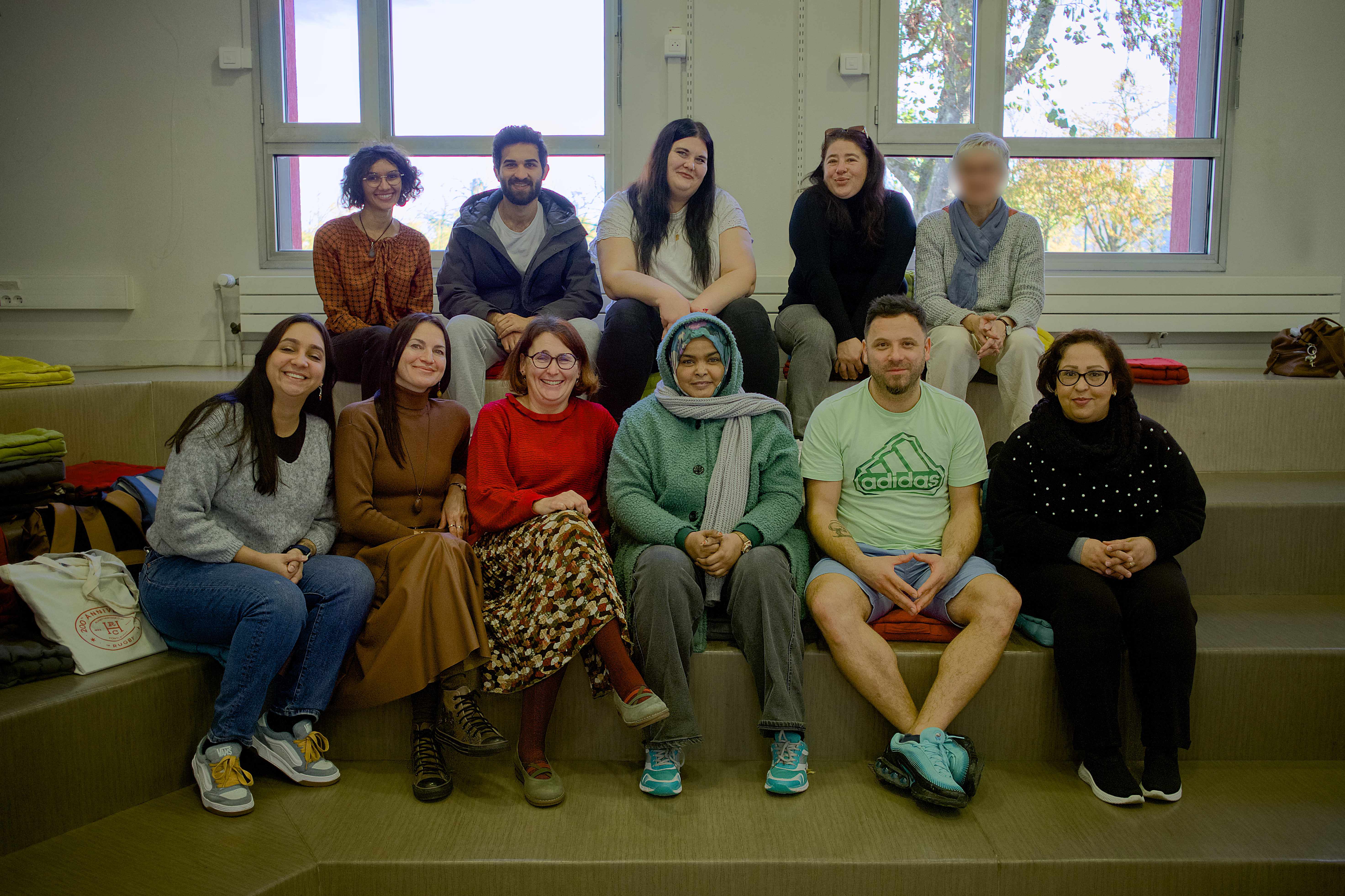 Photo de groupe — stagiaires, bibliothécaires et formatrice